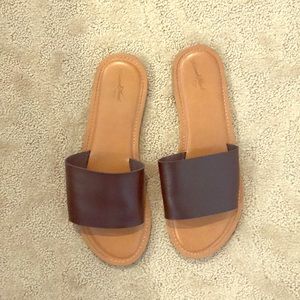 Slip on sandal, black leather.